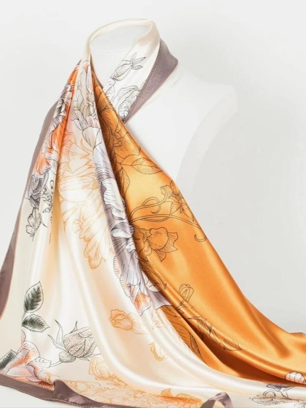 Womens Silk-Like Satin Scarf Features A Diagonal Orange And Cream Floral Pattern